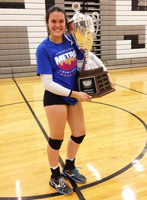 Abby Stomp, La Cueva, with the AlbuquerqueMetro title trophy.