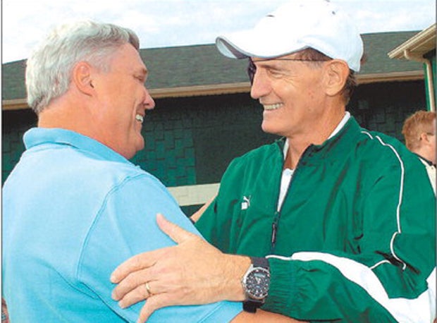 Jim Rattay, right, was honored in Elyria, Ohio, years ago.