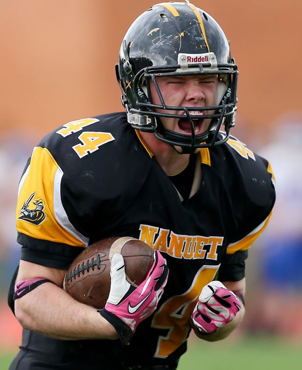 Nanuet (N.Y.) running back Connor Breit celebrates scoring a touchdown against Pearl River.