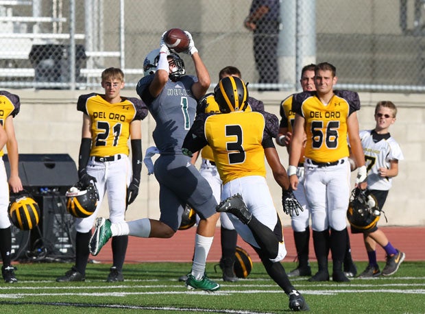 Dashawn Keirsey Jr., of Helix, goes up high for pass. 