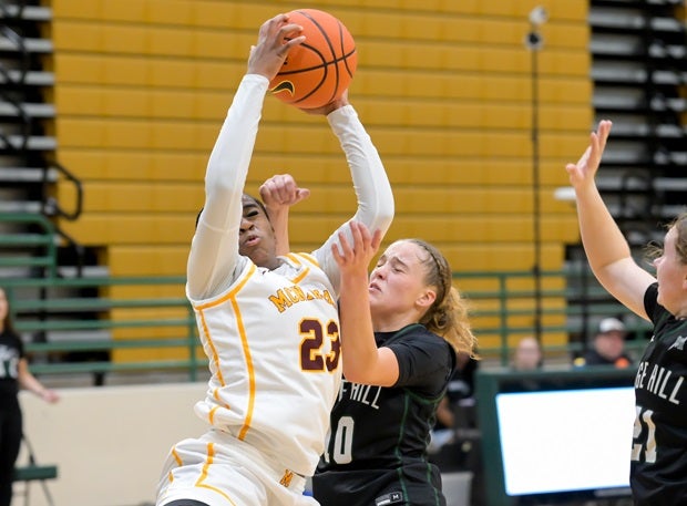 Vanessa Harris of Bishop McNamara grabs a rebound against Sage Hill's Amalia Holguin on Wednesday in the Mustangs' win at the Nike TOC in Mesa, Ariz. (Photo: Darin Sicurello)