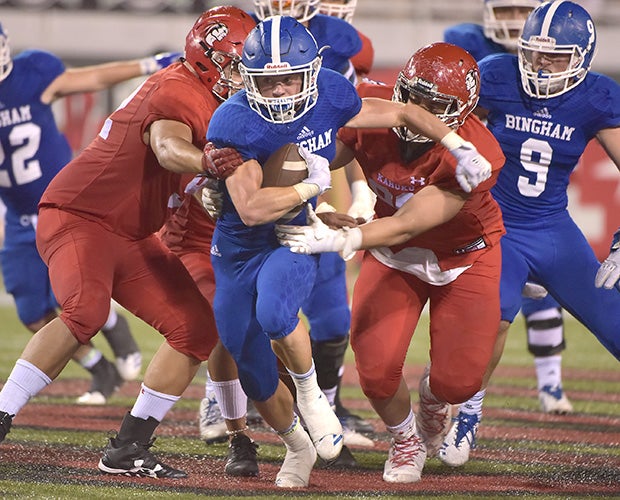 Bradon Wissler of Bingham grinds out yardage against Kahuku on Saturday night at the Polynesian Football Classic in Las Vegas.