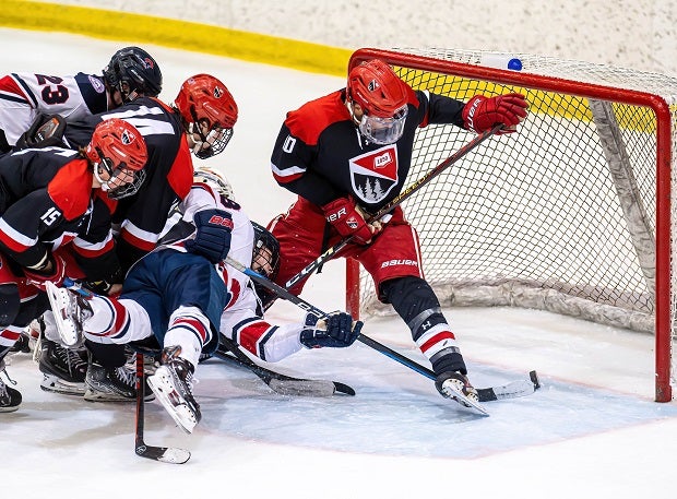 Lawrence Academy's Owen Leahy lays out to score the first of his two goals leading Lawrence to a 4-3 overtime win over Frederick Gunn in the NEPSAC Small School championship. (Photo: Dave Arnold)
