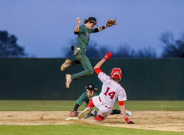 Casey Walls of Blue Ridge goes airborne to avoid contact at second base in a contest with Pottsboro on March 21. Pottsboro won the game 9-0. (Photo: Freddie Beckwith)