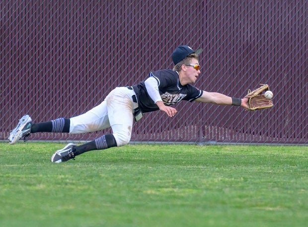 Whitney senior Tyler Allen makes a diving catch in right field with men on base as the Wildcats beat NorCal champs De La Salle 6-5 on March 18. (Photo: Gary Jones)