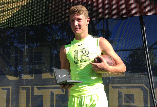 Blake Barnett holds the winning hardware.