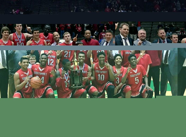 The Southport High boys basketball team celebrates after a tournament victory.