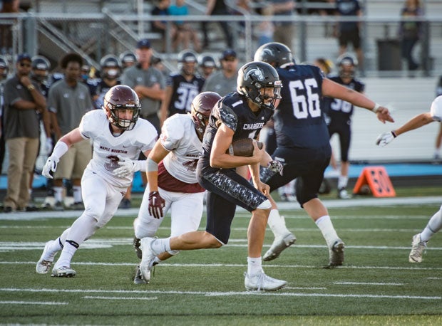 Corner Canyon quarterback Zachary Wilson threw for 567 yards and three touchdowns in a 37-28 loss to Provo.