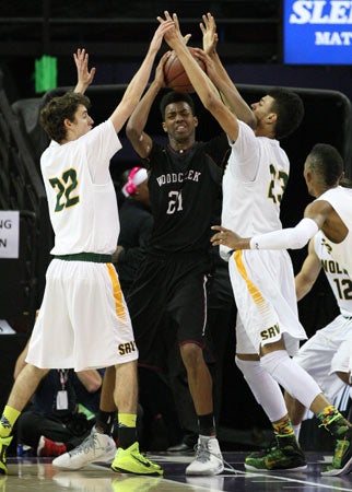 Woodcreek freshman Jordan Brown is surrounded.
