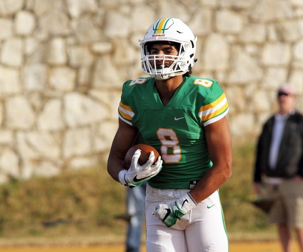 Kenyon Tabor of Derby signed with Kansas.