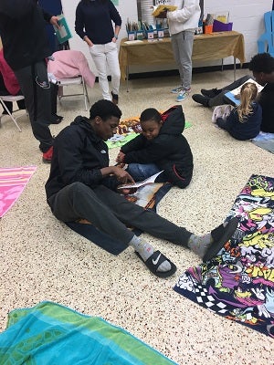 In addition to being a standout football player,
Grimes also gives back to his community by
reading to elementary school children.