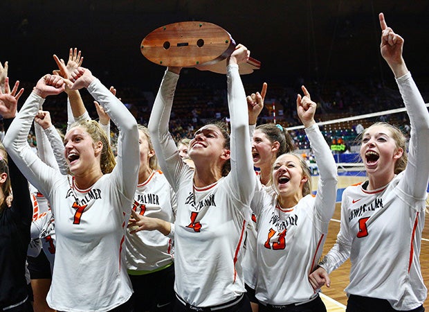 Lewis-Palmer (Colo.) players hoist the trophy while celebrating their victory in the CHSAA 4A state championship.