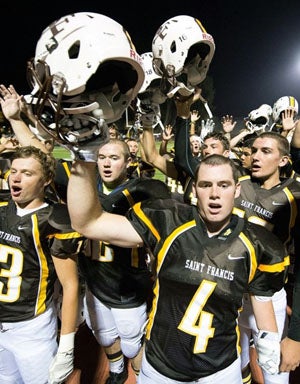 Riley Quinn (4) leading a post-game cheer.