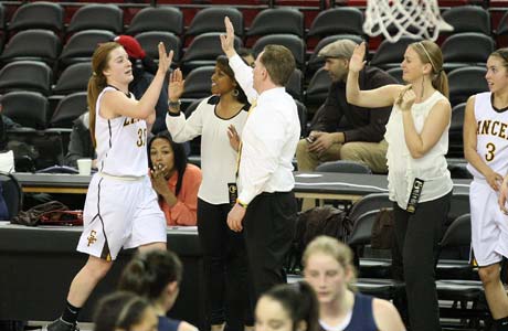 St. Francis' Jennifer Lucian (35) is about to slap hands with coach Brian Harrigan after their team's Division II NorCal title win over Lynbrook.