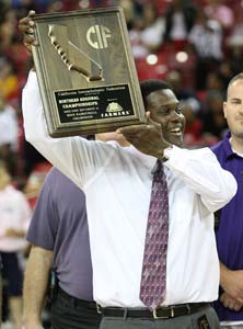College Park coach Craig Battle holds
up his school's first NorCal title
trophy. It was well earned.
