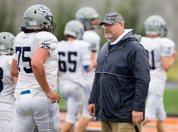 Soldotna head coach Galen Brantley Jr. gives instruction prior to a game in August.