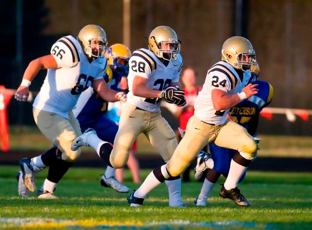 West Albany's Anthony LaCoste (28) takes off during a 312-yard performance last fall against Jefferson.