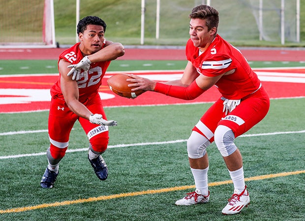 Running back Sione Molisi and quarterback Ben Ford.