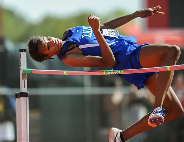 A Xavier College Prep (Phoenix, Ariz.) athlete looks to clear the high jump bar during the AIA Track and Field Championships.