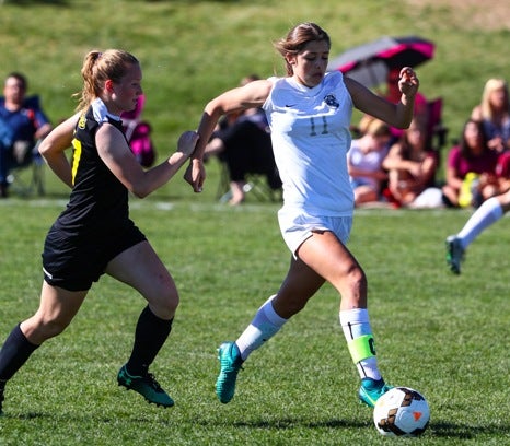 The Academy's Alexis Loera, right, is the most prolific scorer in Class 3A. The senior, who has tallied 41 goals this season, leads the Wildcats into the state championship game Tuesday against Peak to Peak.