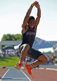 Claremont's Klyvens Delunay won the
triple jump with a wind-aided
mark of 51-7.