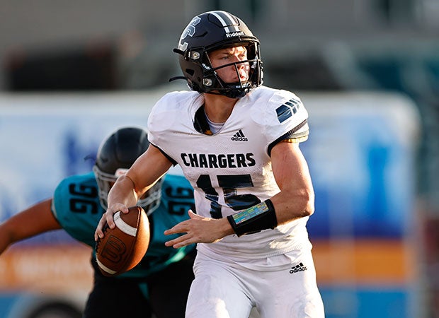 Devin Brown looks downfield during Corner Canyon's 72-21 win over Farmington on Friday night.