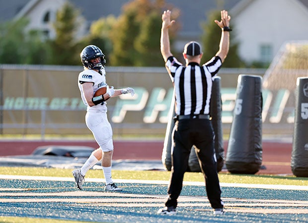 Corner Canyon receiver Jon King scores a first-half touchdown.