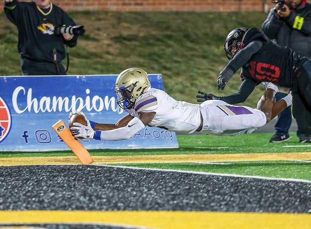 Christian Brothers' Jeremiyah Love dives and scores the winning touchdown in overtime over Lee's Summit North in the MSHSAA Class 6 championship game. (Photo: David Smith)