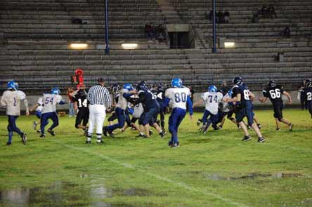 Standing water on the field is often a part of playing football in Astoria, Ore. Add in the fog and cold, and it's no wonder that Knappa High holds indoor practices sometimes.