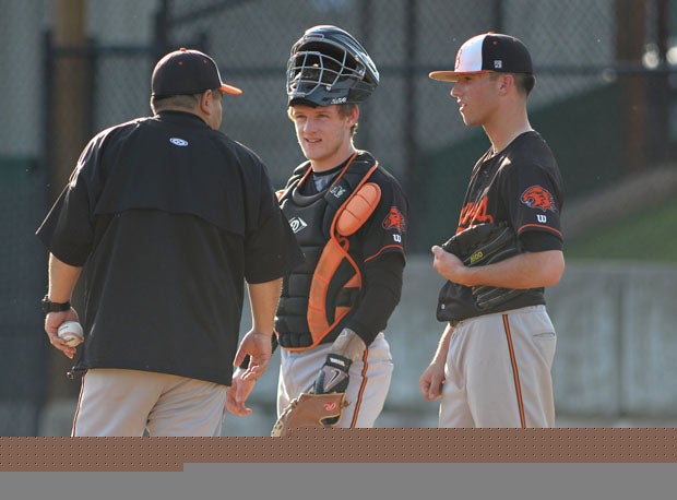 Coach Derek Nekoba with some encouraging words. 