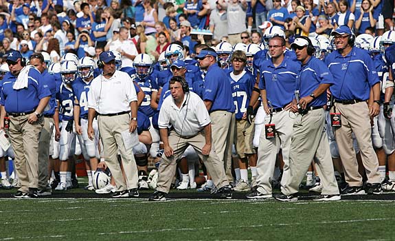 Coach Steve Specht (second to the right) and St. Xavier beat three out-of-state opponents in 2007.