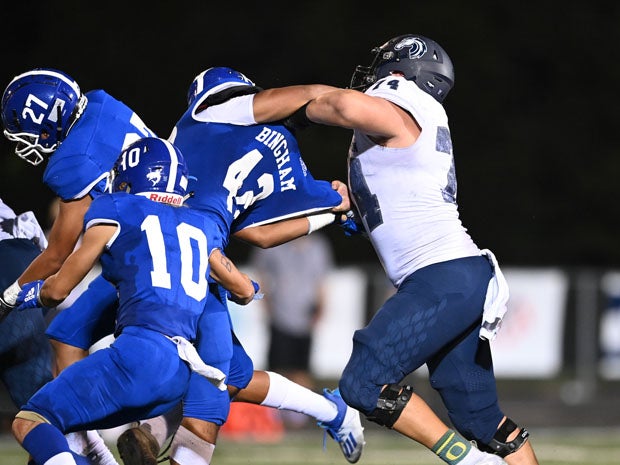 Corner Canyon center Jackson Light, an Oregon commit, battled all night with Bingham's rugged interior line. 