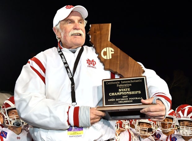 Head coach Bruce Rollinson celebrates Mater Dei's first state title following a 52-21 thrashing of storied De La Salle.