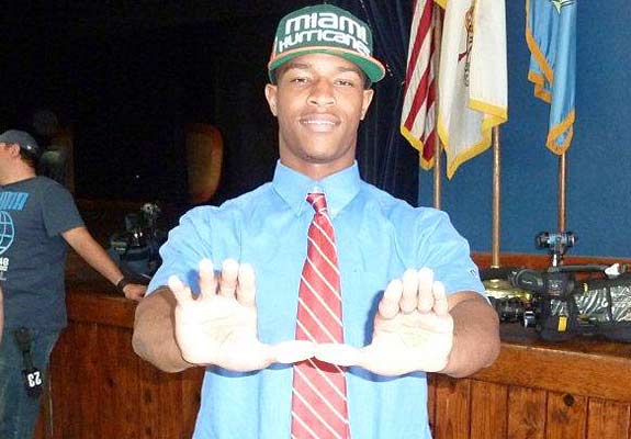 It was a banner day for Miami. Al Golden and staff landed an extremely impressive defensive class, featuring defensive back Deon Bush, seen here throwing up the "U."