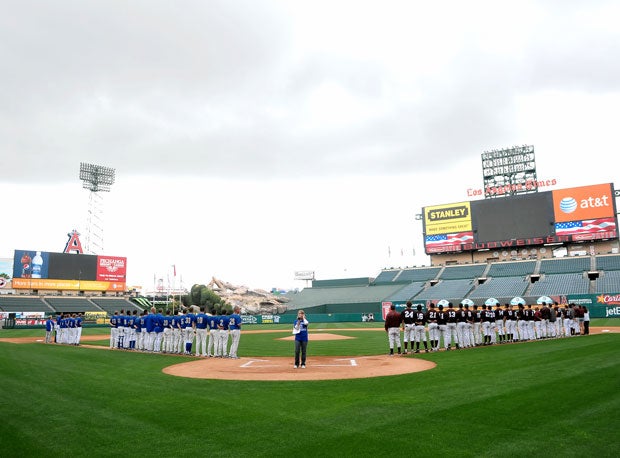San Dimas and Torrance stand for the "Star Spangled Banner" at Angel Stadium of Anaheim before the 2009 Southern Section Division IV title game.