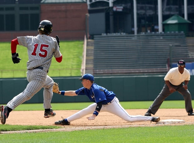 Hebron's first baseman stretches for a throw in 2009 at Rangers Ballpark in Arlington against Colleyville-Heritage.