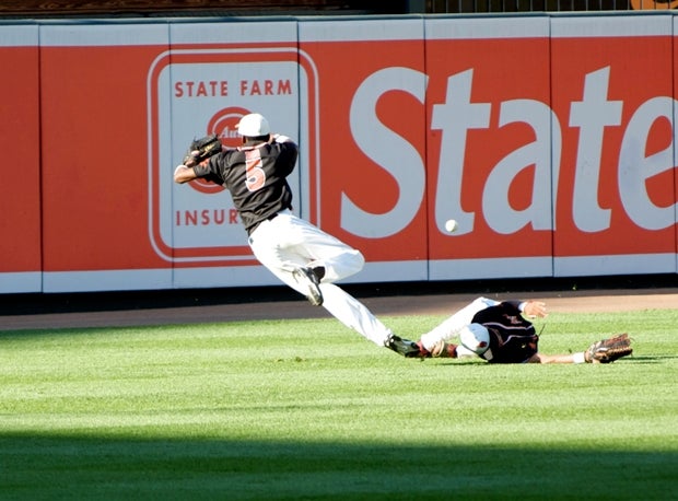 Outfielders gun for a hit to the outfield in the 2009 MSABC Brooks Robinson All-star Game at Oriole Park at Camden Yards.
