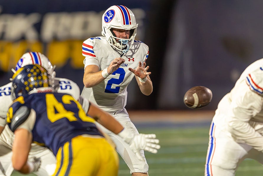 California commit Brody Rudnicki scored on three touchdown runs to lift Folsom to its 26th consecutive win over Oak Ridge. (PHOTO: Steve Cason)