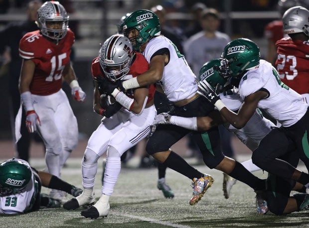 Justin Flowe makes a habit of standing up ball carriers.