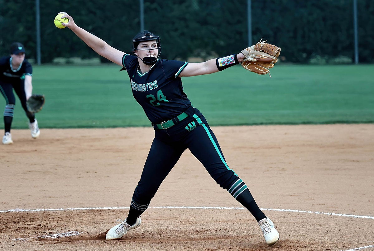 Joella Thomas of No. 10 Weddington went over 800 career strikeouts this postseason. The Lenoir-Rhyne signee struck out 11 batters in the first game of the championship series as the Warriors won their first state crown while finishing the season undefeated. (PHOTO: Tom Masters)