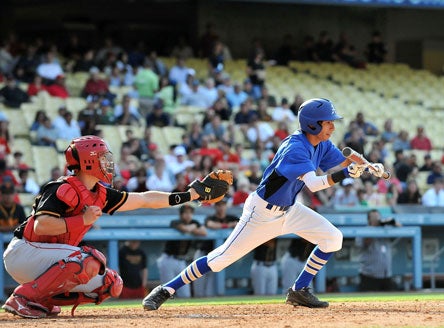 The bunt is making its way back into baseball as changes in metal bat rules have caused managers to rethink strategy.