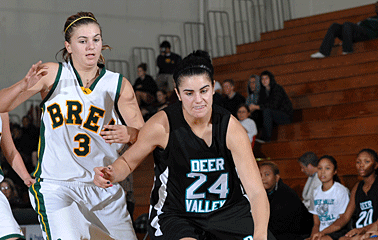 Emily Allard drives on an opponent.