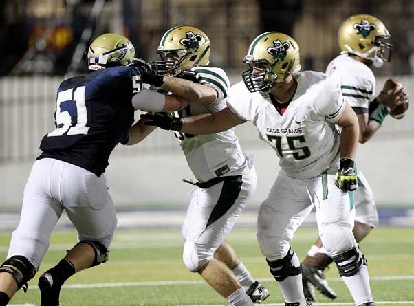 Casa Grande's offensive line, shown here with Peter Parrick (75), always has JaJuan Lawson's back. 