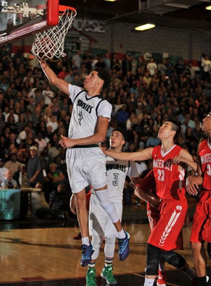 Lonzo Ball (2) goes up for a deuce. 