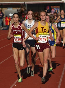 Stanford-bound Alli Billmeyer (right) won a
remarkable double, before an even more
unlikely split in the 1,600 relay.