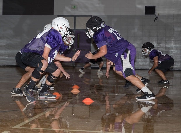 Shasta players have been practicing in the gym due to smoky conditions in Redding doe to the Carr Fire. Most of the programs players were evacuated during the deadly blaze, while a handful of players lost family homes in the fire.