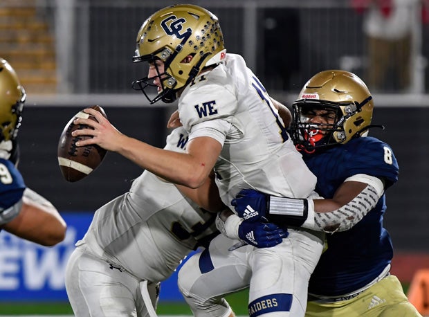 Mater Dei Catholic defensive end Jason Harden (8) with a sack of Tyler Wentworth.