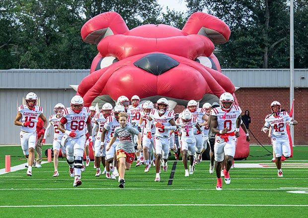 Carthage takes the field for its season opener against Kilgore. Being on top is nothing new for the Bulldogs, who are 143-10 since 2014 and have won 10 state titles since 2008. (PHOTO: Wayne Grubbs)
