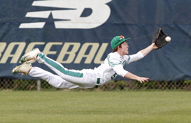 Rhea County (Tenn.) center fielder Westin Ray makes a diving catch during a game against Soddy Daisy.