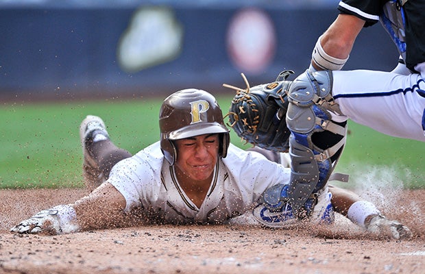 Jimmy Chatfield of Parker (Calif.) is tagged out sliding in to home plate by La Jolla Country Day catcher Ben Petty-Hull.